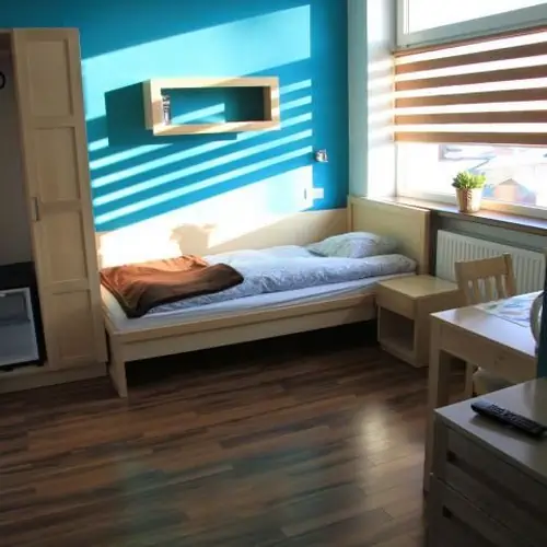 pok&oacute;j trzyosobowy