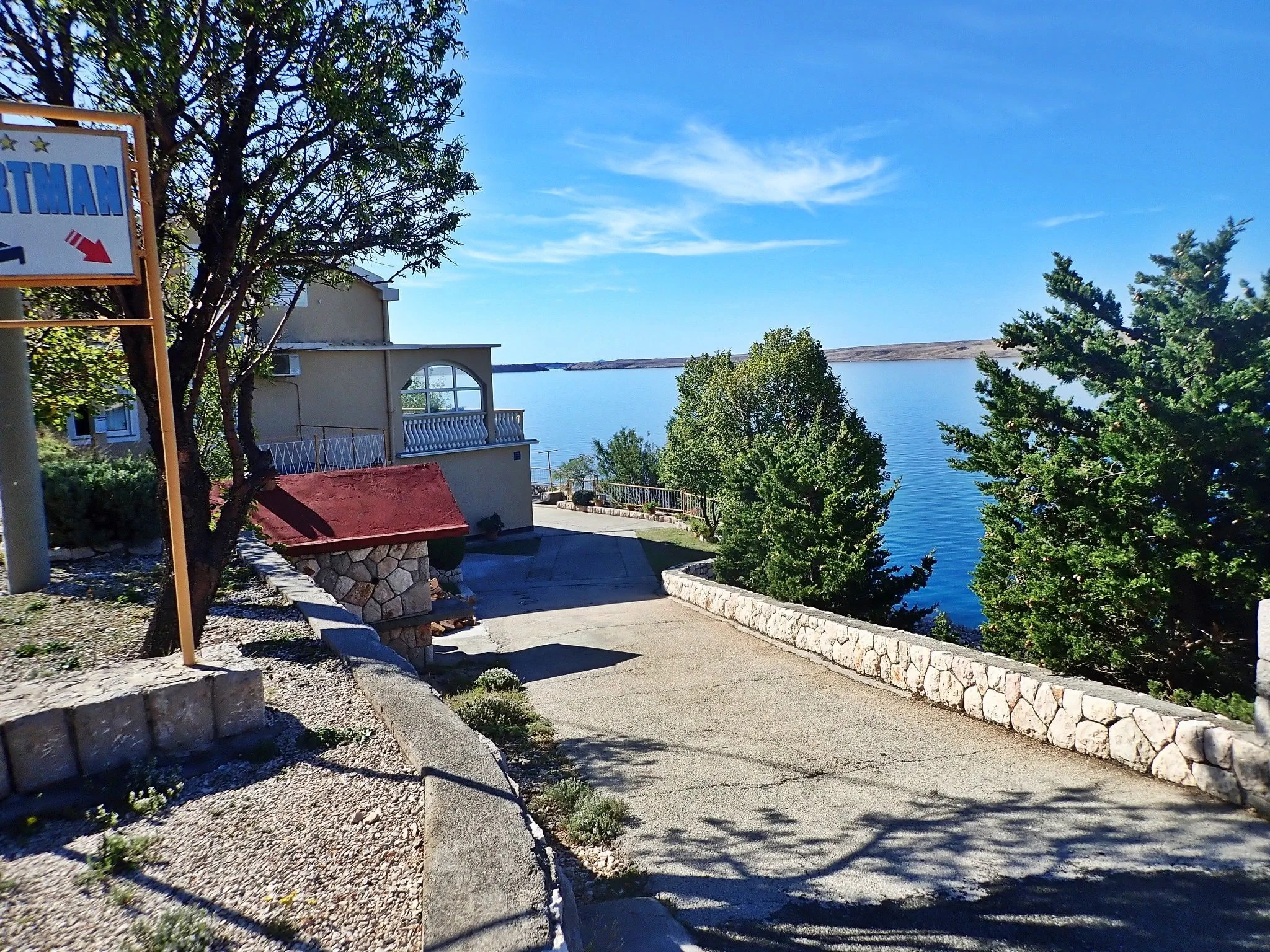 Apartment Jela-on the seafront Tribanj