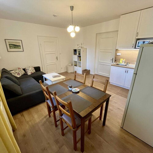 Obývák s kuchyňským koutem