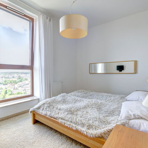 Sypialnia z widokiem na port i miasto