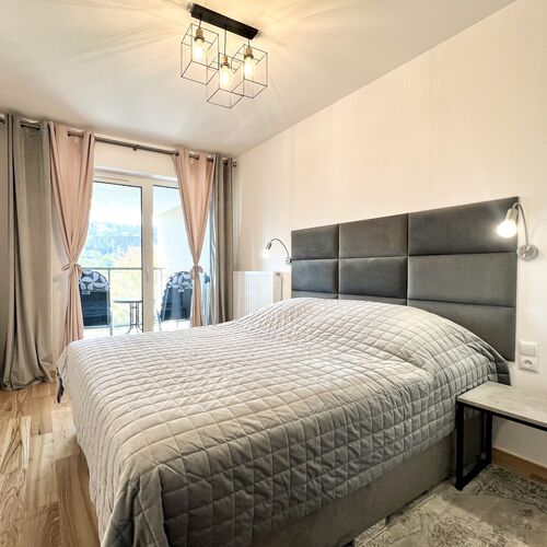 Sypialnia z dwuosobowym ł&oacute;żkiem