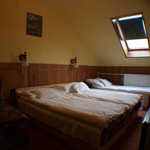 Dreibettzimmer Obergeschoss im Dachgeschoss