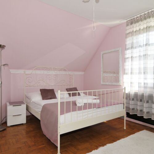 Camera dubla la mansarda cu balcon