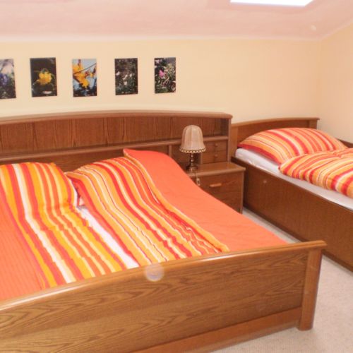 Dreibettzimmer im Dachgeschoss