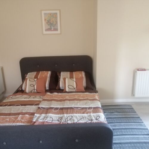 Apartament 4-osobowy na parterze z widokiem na ogród z 2 pomieszczeniami sypialnianymi