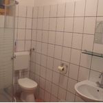 Földszintes fürdőszobás franciaágyas szoba
