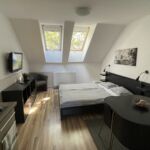 Apartament 4-osobowy Komfort z widokiem na dziedziniec z 2 pomieszczeniami sypialnianymi (możliwa dostawka)