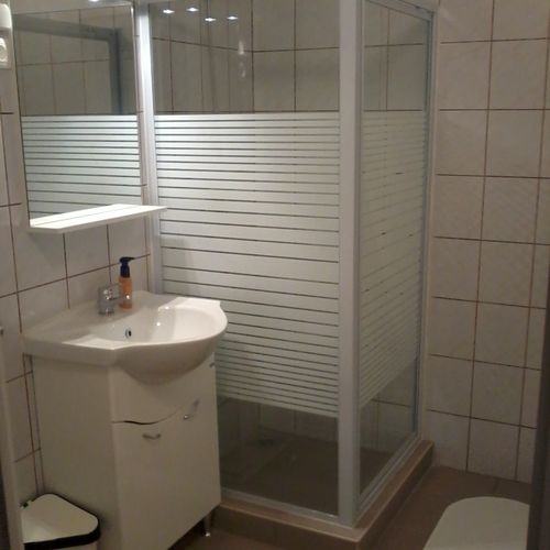 Pokoj s koupelnou pro 4 os. s výhled do zahrady