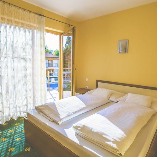 Apartament 4-osobowy Family z balkonem z 1 pomieszczeniem sypialnianym (możliwa dostawka)