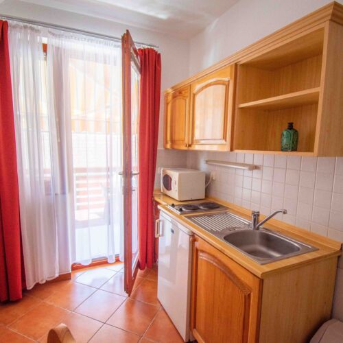 Apartman s balkónem pro 5 os. se 2 ložnicemi v podkroví