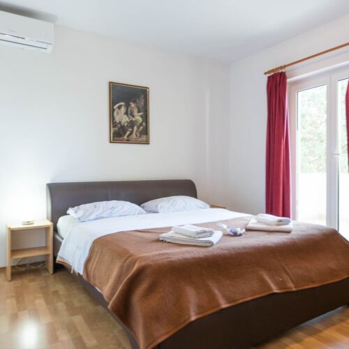 Apartman s balkónem s manželskou postelí s 1 ložnicí s výhledem na moře (s možností přistýlky)