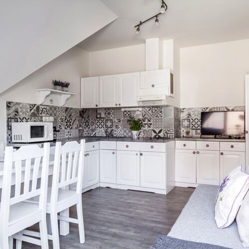 Apartament la mansardă cu balcon cu 2 camere pentru 4 pers.