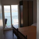 Apartament 4-osobowy na parterze z widokiem na morze z 2 pomieszczeniami sypialnianymi (możliwa dostawka)