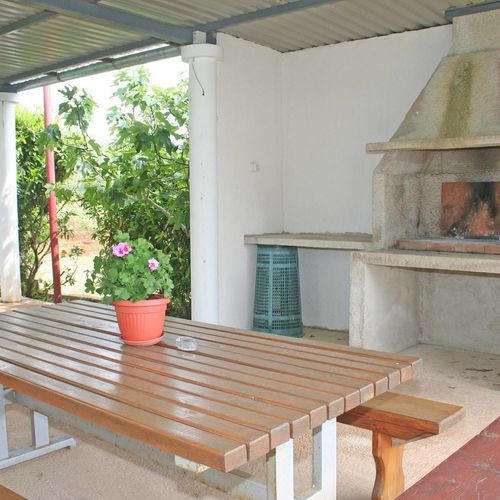 Apartament cu aer condiționat cu grădină cu 2 camere pentru 4 pers.