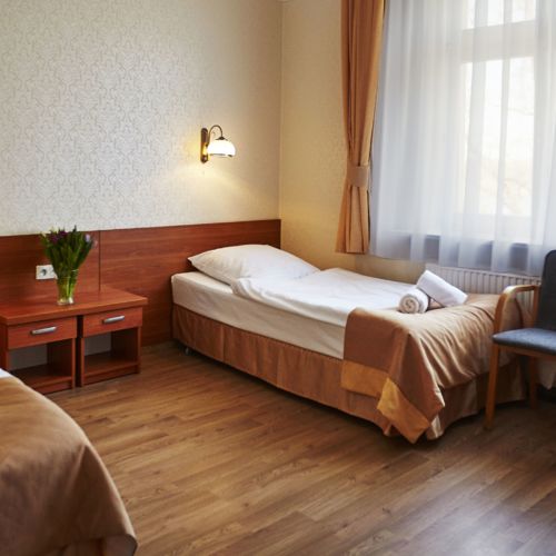 Classic Pokoj s koupelnou s manželskou postelí (s možností přistýlky)