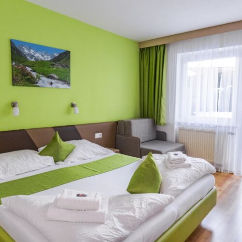 Pokój 4-osobowy Komfort z dostępem do ogrodu