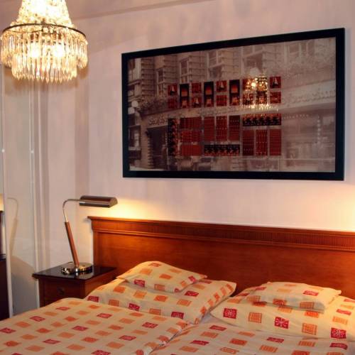 Camera twin la parter cu bucătărie comună