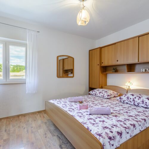 Apartament 4-osobowy z klimatyzacją z tarasem z 2 pomieszczeniami sypialnianymi A-2952-b