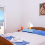 Apartman s klimatizací pro 4 os. se 2 ložnicemi s výhledem na moře A-6919-a