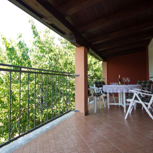 Apartament 4-osobowy z klimatyzacją z tarasem z 2 pomieszczeniami sypialnianymi A-6926-a