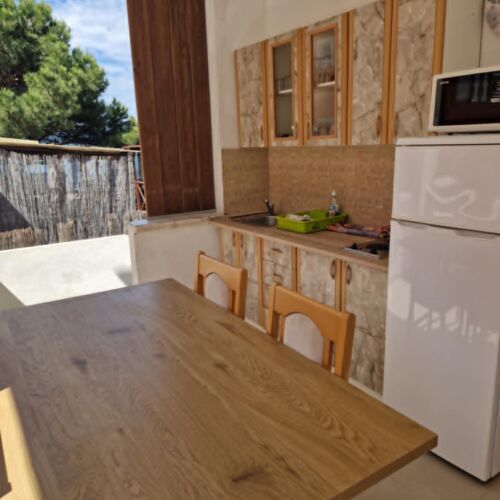 Apartament 4-osobowy na parterze z balkonem z 2 pomieszczeniami sypialnianymi (możliwa dostawka)