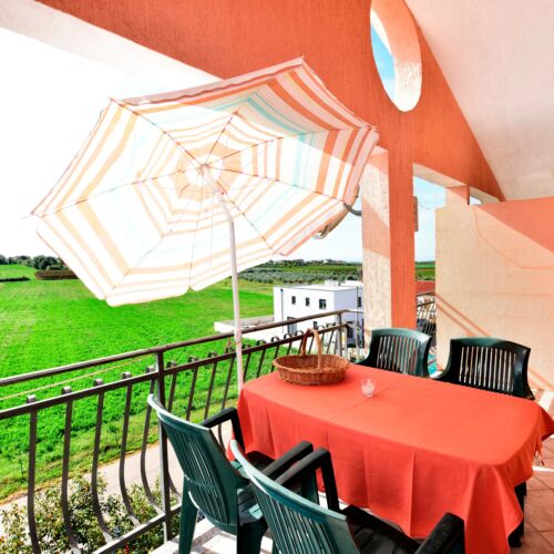 Apartament 4-osobowy z klimatyzacją z tarasem z 1 pomieszczeniem sypialnianym A-6951-a