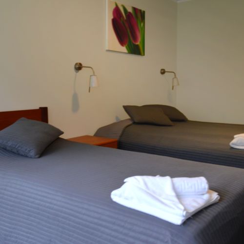 Camera tripla cu grup sanitar cu vedere spre munte