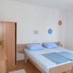 Apartament 4-osobowy z klimatyzacją z tarasem z 2 pomieszczeniami sypialnianymi A-14996-b