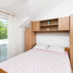 Apartament 4-osobowy z klimatyzacją na piętrze z 2 pomieszczeniami sypialnianymi
