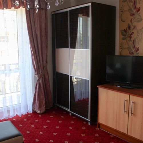 Pokoj s balkónem  s manželskou postelí