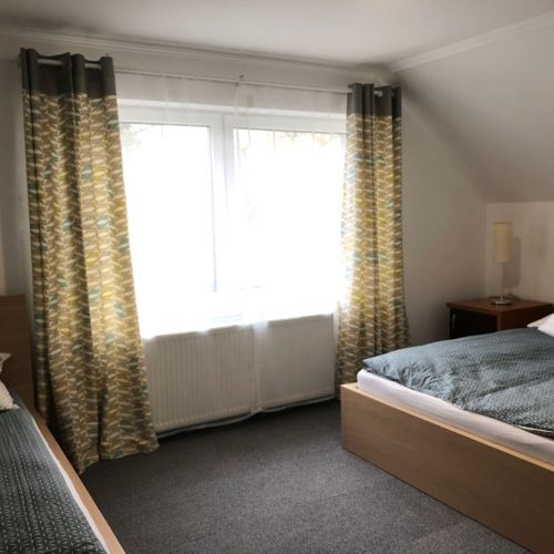 Pokoj s klimatizací pro 3 os. na poschodí