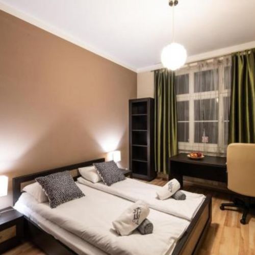 Apartament 4-osobowy z balkonem z 2 pomieszczeniami sypialnianymi