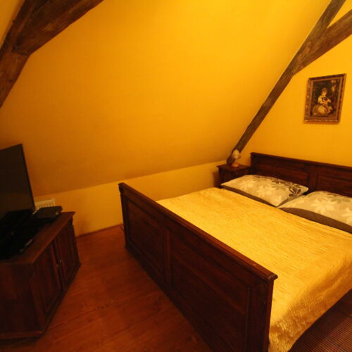 Pokoj s manželskou postelí