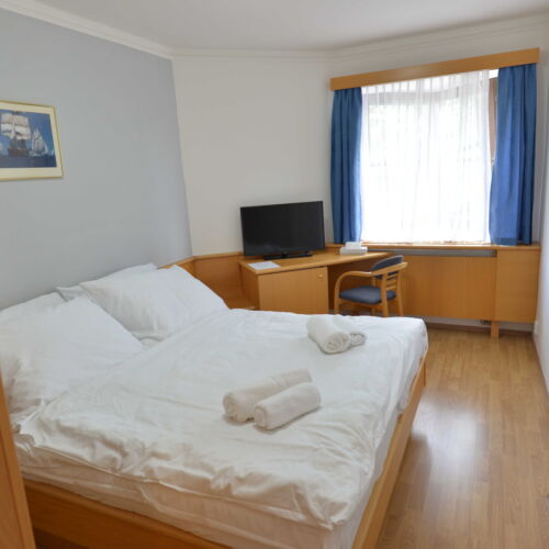 Pokoj s manželskou postelí