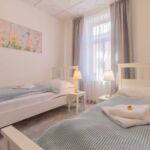 5 Třílůžkový Apartmán s oddělenými postelemi
