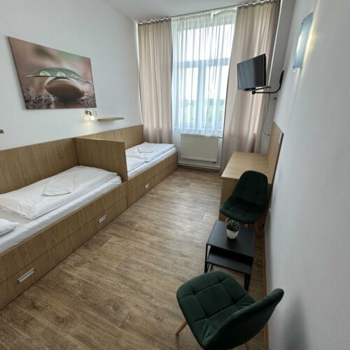 Air Conditioned Twin Room with Shower (extra beds available)