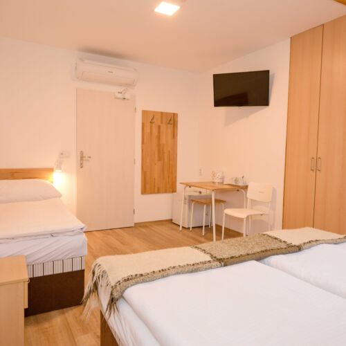 Mansard Triple Room