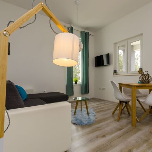 Apartament 3-osobowy z klimatyzacją na parterze z 2 pomieszczeniami sypialnianymi