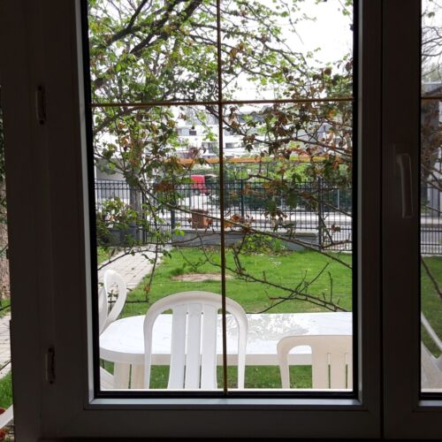 Doppelzimmer mit Terasse und Aussicht auf den Garten
