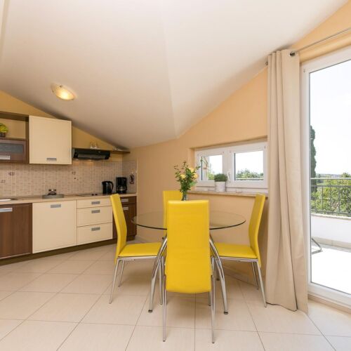 Apartament 2-osobowy na poddaszu częściowy z widokiem na morze z 1 pomieszczeniem sypialnianym