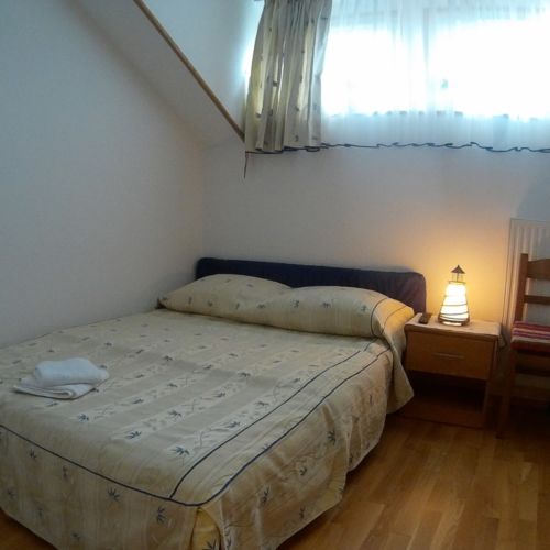 Tourist Pokoj s manželskou postelí na poschodí