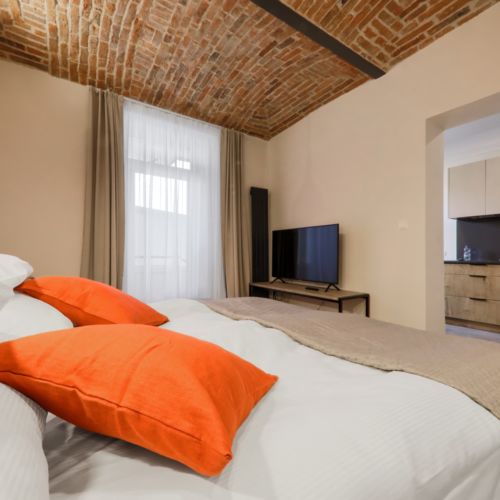 Apartament 2-osobowy na parterze z 1 pomieszczeniem sypialnianym