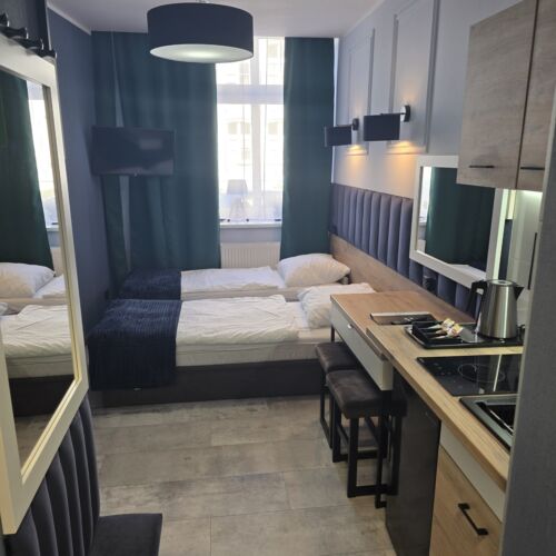 Camera twin la parter cu chicinetă proprie