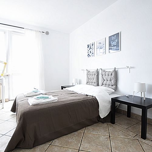 Se společnou kuchyňkou Pokoj s balkónem s manželskou postelí