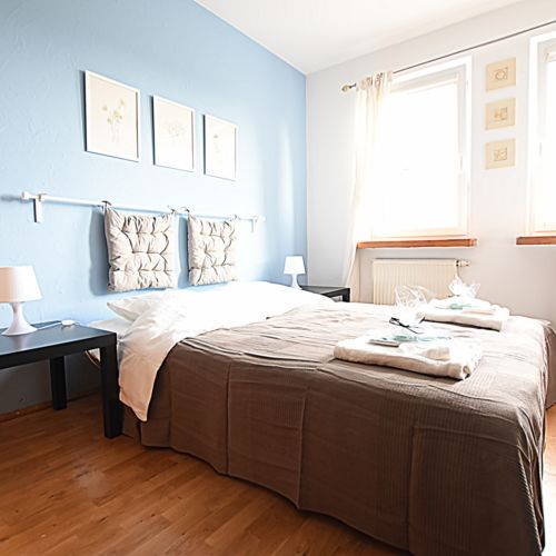 Se společnou kuchyňkou Pokoj s manželskou postelí s výhledem do zahrady