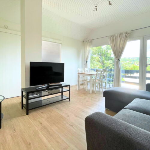 Apartament 4-osobowy na piętrze z balkonem z 2 pomieszczeniami sypialnianymi