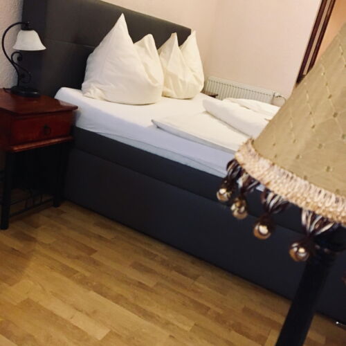 Double Room with Shower (extra beds available)