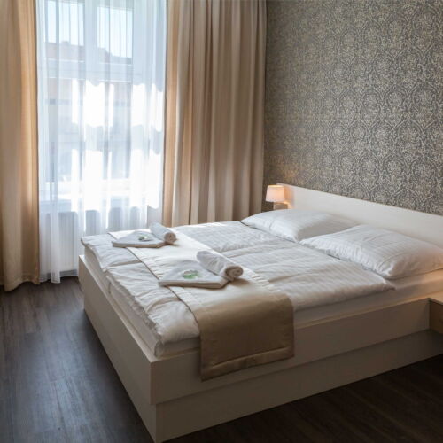 Apartman s vlastní kuchyňkou  s manželskou postelí s 1 ložnicí (s možností přistýlky)