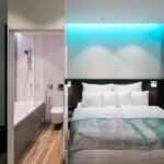 119 - dvoulůžkový pokoj typu Imperial Design Deluxe s manželskou postelí nebo oddělenými postelemi, vířivou vanou a balkónem - Reflection - Karel Novotný