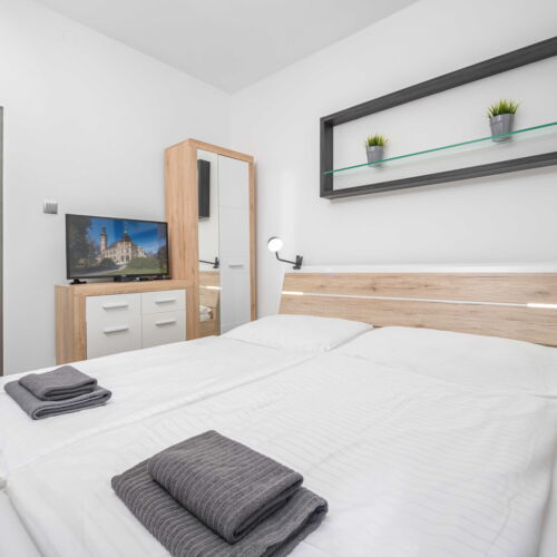 Apartament 4-osobowy z aneksem kuchennym z 2 pomieszczeniami sypialnianymi